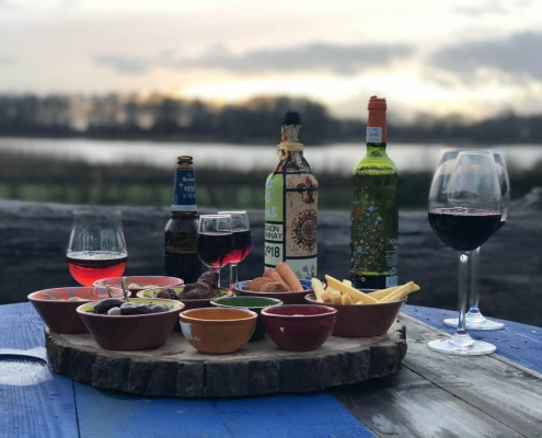 Geestmerambacht - Hapjes en wijn op het terras van el Chiringuito met uitzicht over het meer Geestmerambacht